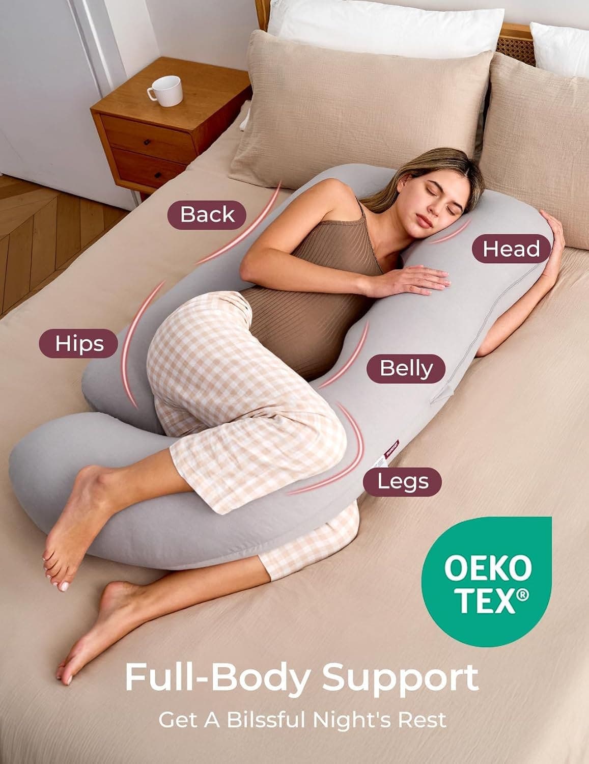 Pregnant woman side sleeping with neutral spine alignment in the Momcozy pillow