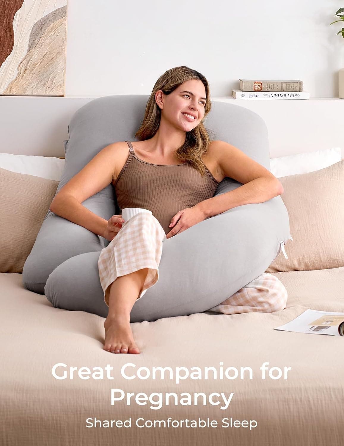 Unpacking the Momcozy pregnancy pillow from its compressed packaging