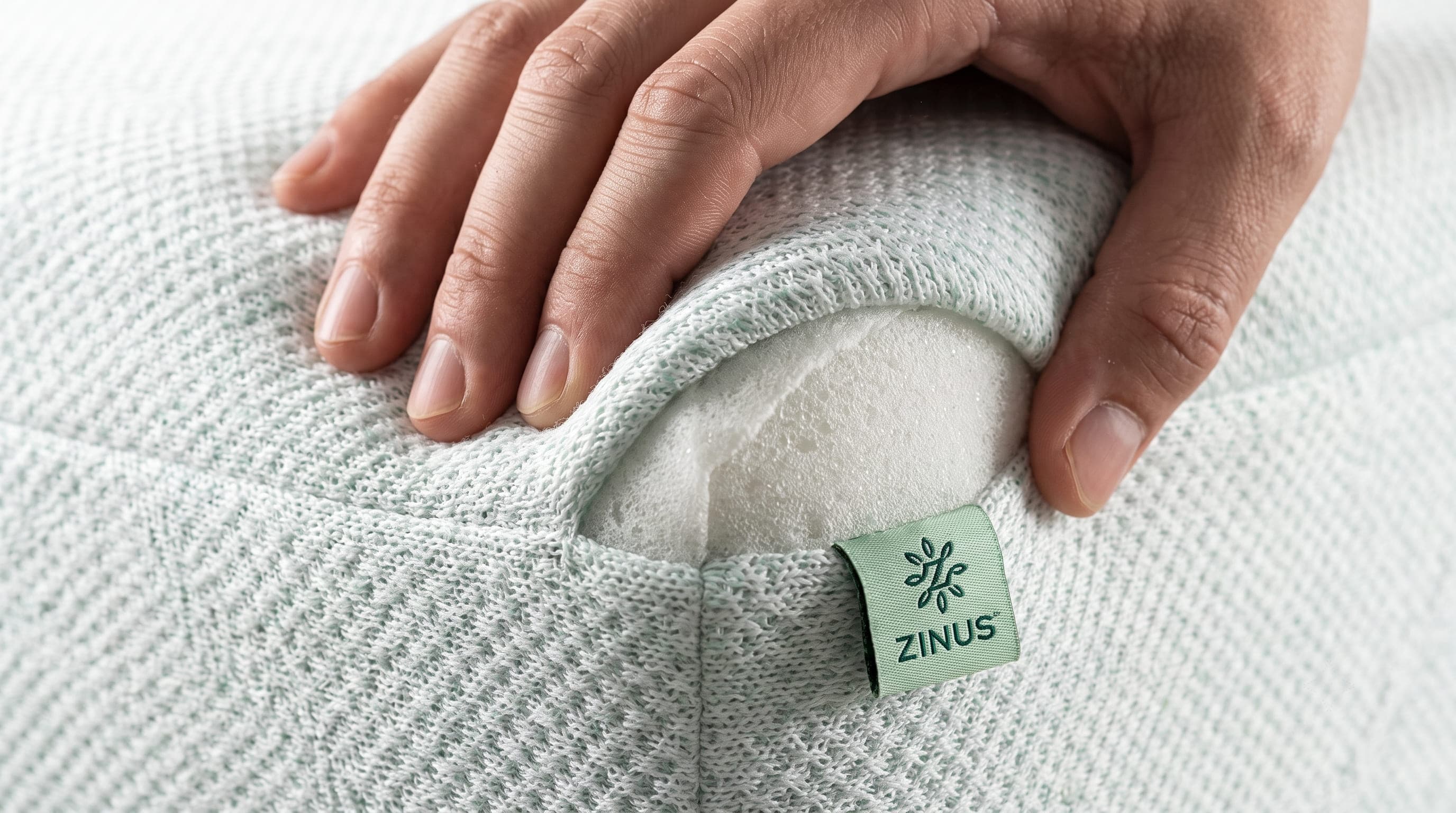 Cover detail on the Zinus Green Tea Cooling 10″: fabric, stitching and how it feels against the skin.
