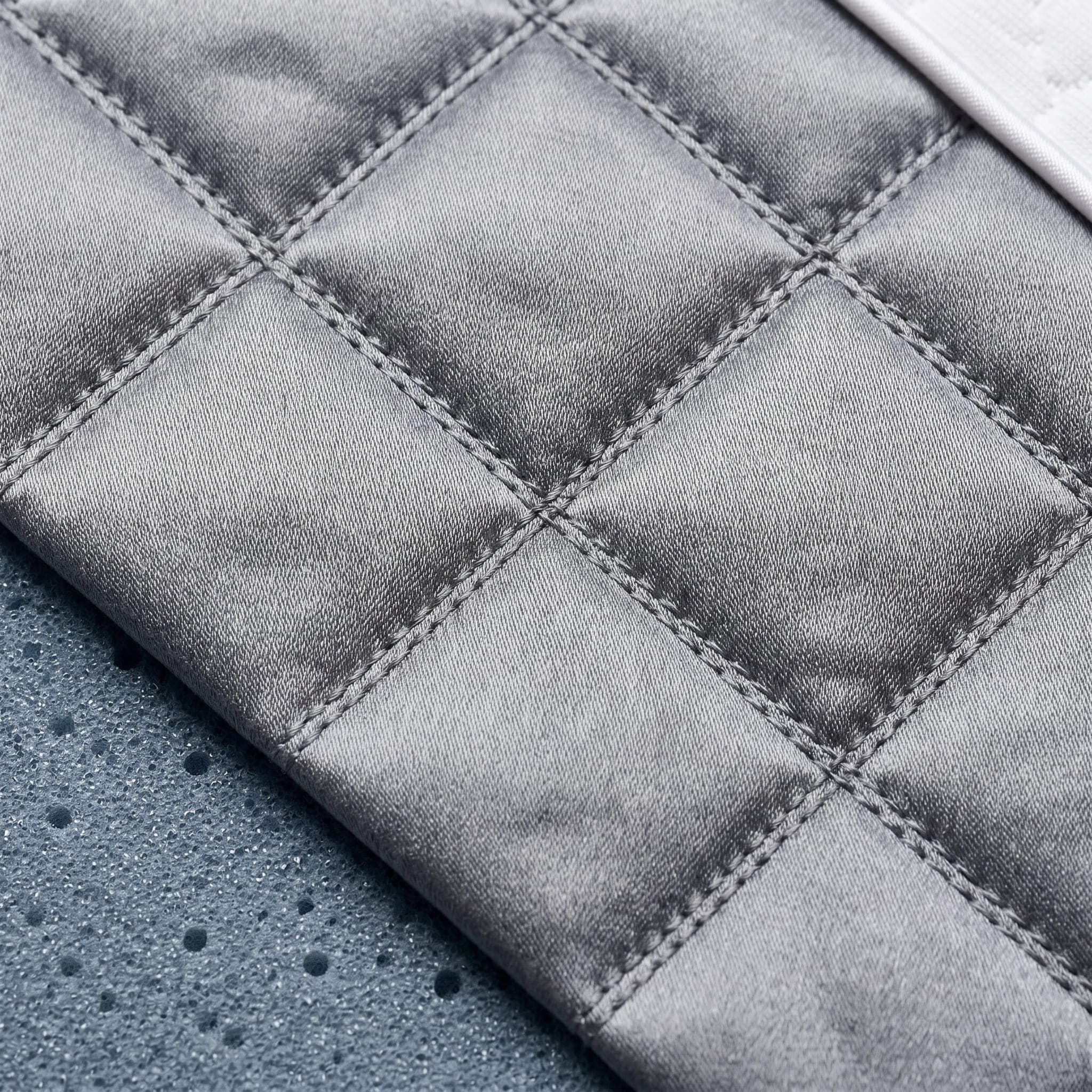 Cover detail on the Nectar Classic Queen: fabric, stitching and how it feels against the skin.