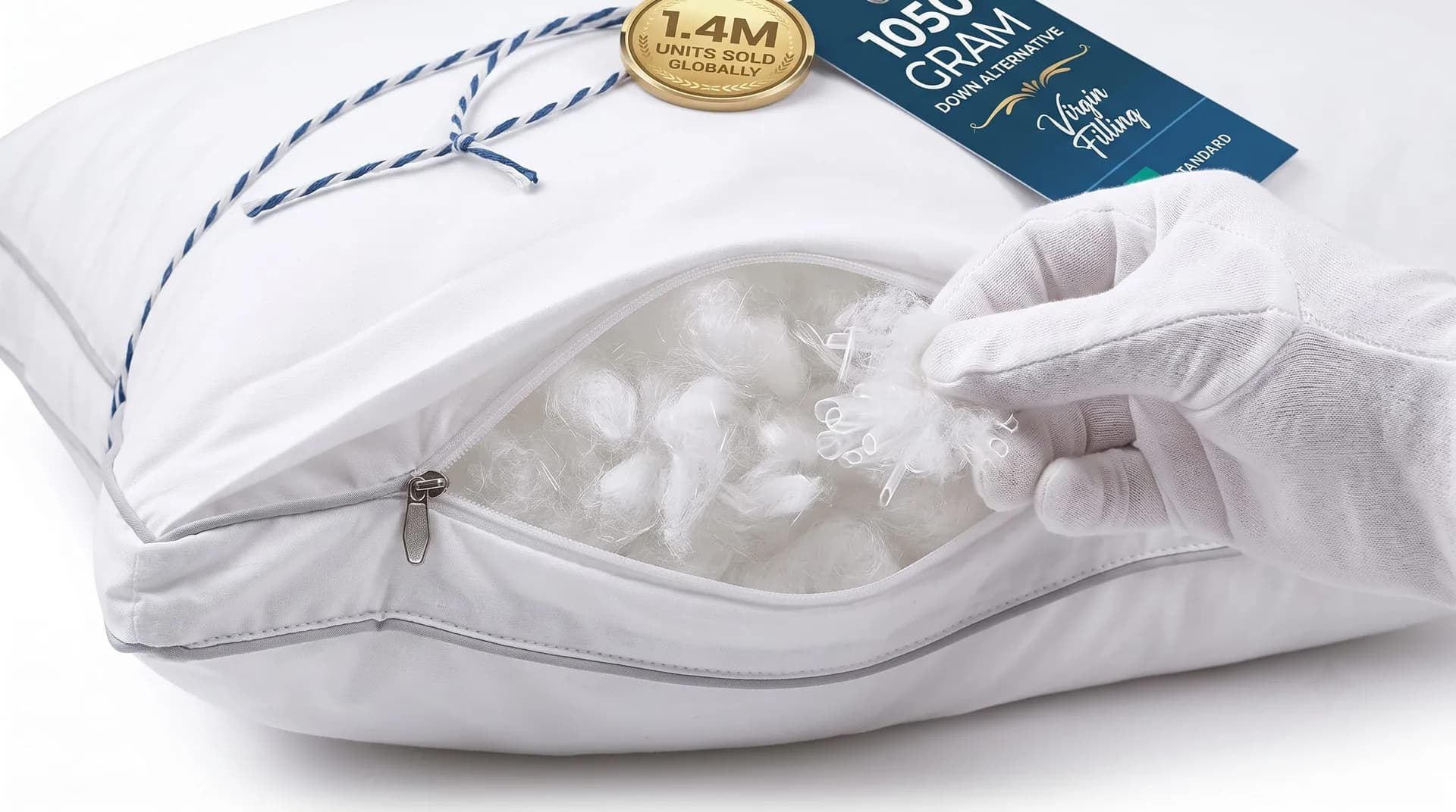 Opened Utopia Bedding pillow showing white fiber fill and a 1050 gram fill-weight tag